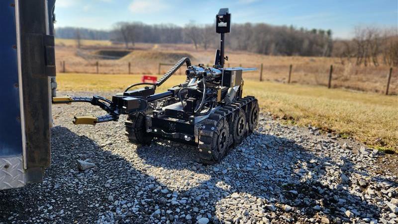 Hazardous Device Team bomb robot on gravel area during training exercise
